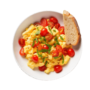 Jajecznica z pomidorami i ziołami, zbilansowane śniadanie białkowo-tłuszczowe